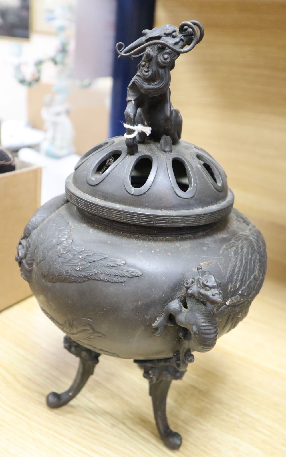 A Japanese bronze phoenix tripod koro and cover, Meiji period, signed, overall height 34cm